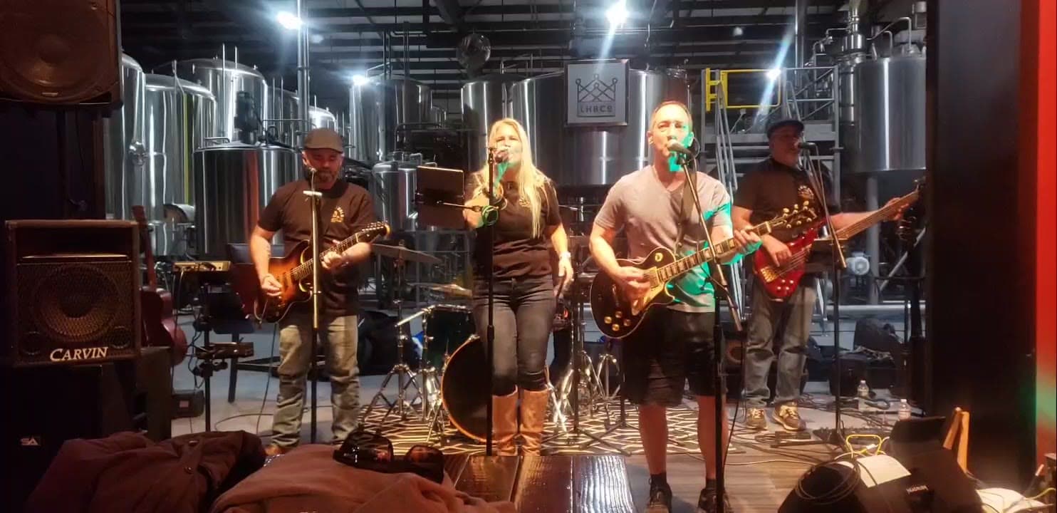 Out of the House Band performing live at a brewery